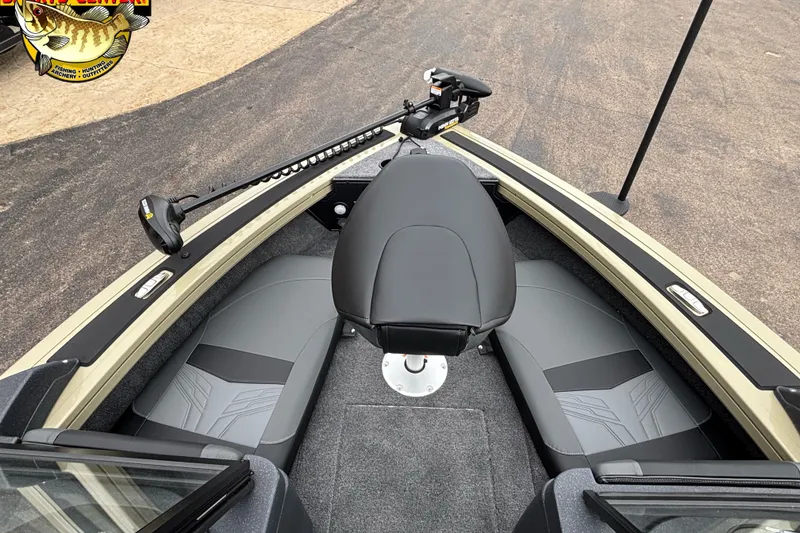 Slide: The Image of 2026 Tracker Targa V-18 Combo boat interior with seating and trolling motor. - 6