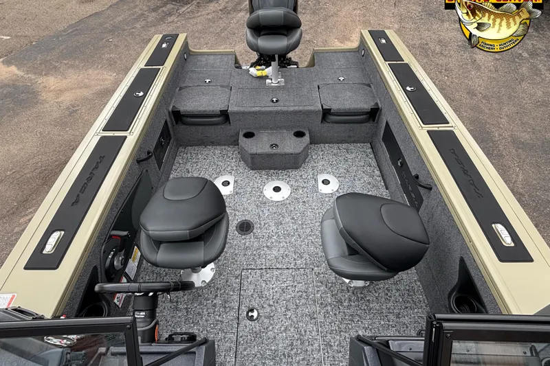 Slide: The Image of 2026 Tracker Targa V-18 Combo boat interior with seating and storage compartments. - 7