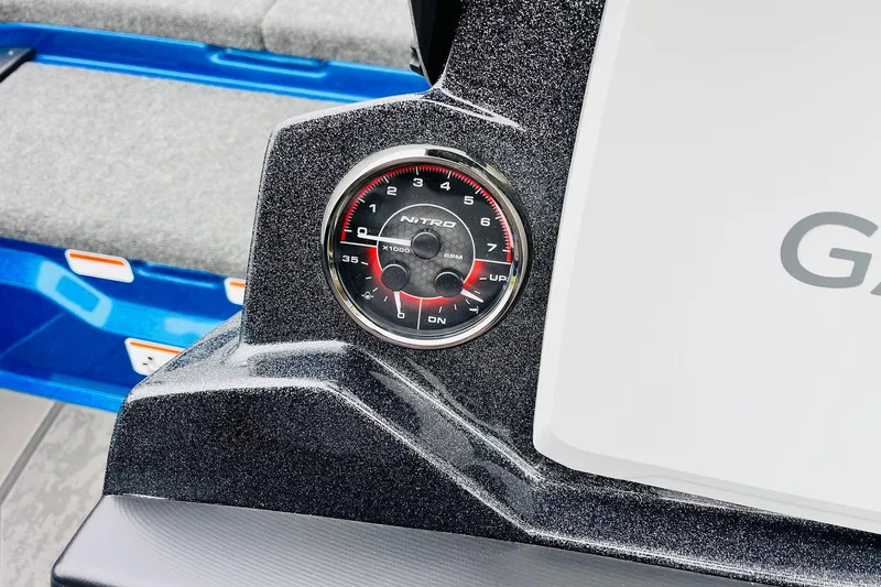 Slide: The Image of 2026 Nitro Z21 XL Pro boat dashboard with RPM gauge detail. - 100