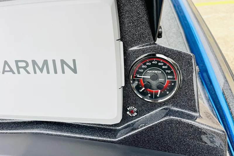 Slide: The Image of 2026 Nitro Z21 XL Pro dashboard with Garmin display and speedometer. - 101