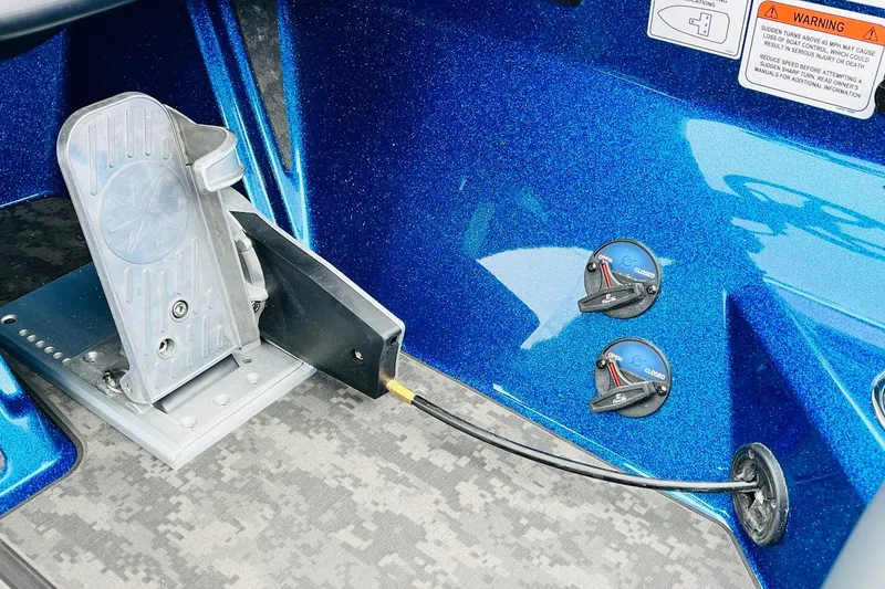 Slide: The Image of 2026 Nitro Z21 XL Pro boat controls with foot pedal and valve switches. - 103
