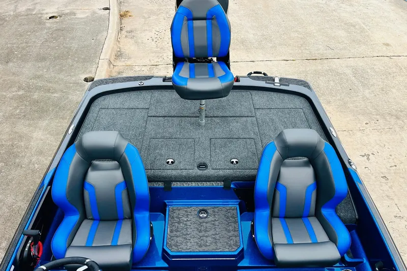 Slide: The Image of 2026 Nitro Z21 XL Pro boat interior with blue and gray seating, top view. - 106