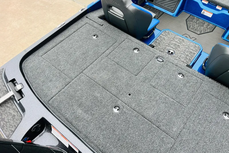 Slide: The Image of 2026 Nitro Z21 XL Pro boat interior with spacious carpeted deck and seating. - 114