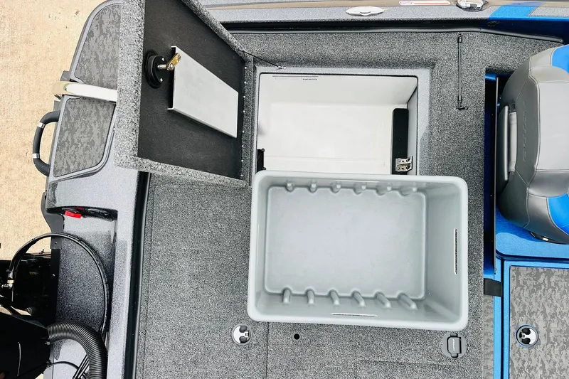 Slide: The Image of 2026 Nitro Z21 XL Pro boat storage compartments with open lids and seating area. - 117
