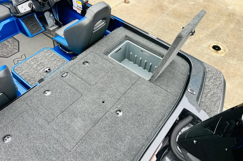 Slide: The Image of 2026 Nitro Z21 XL Pro boat interior with open storage compartment and seating. - 119