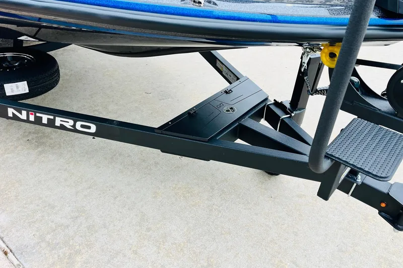 Slide: The Image of 2026 Nitro Z21 XL Pro boat trailer with black frame and step. - 127
