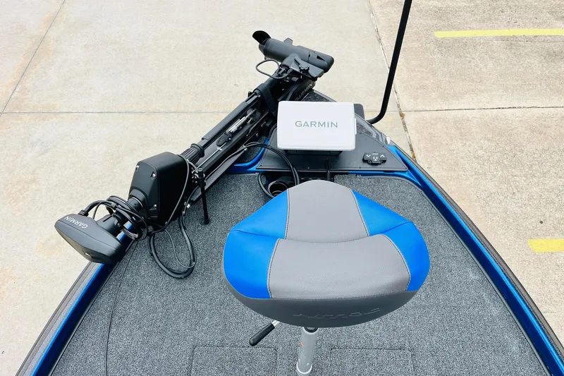 Slide: The Image of 2026 Nitro Z21 XL Pro boat with Garmin equipment and blue-gray seating. - 70