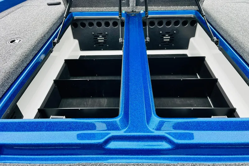 Slide: The Image of 2026 Nitro Z21 XL Pro boat storage compartments with blue finish and organized interior layout. - 86