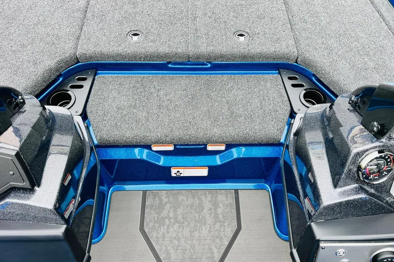 Slide: The Image of 2026 Nitro Z21 XL Pro boat interior with blue accents and carpeted surfaces. - 87