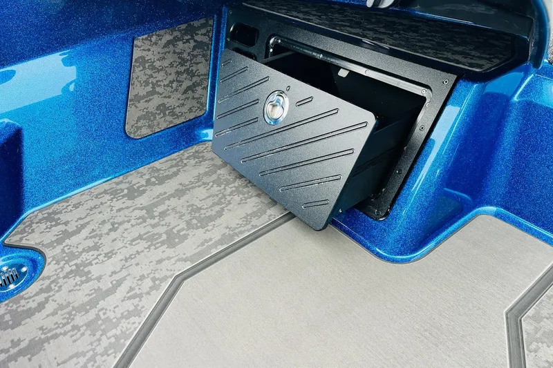 Slide: The Image of 2026 Nitro Z21 XL Pro boat storage compartment with sleek blue finish and secure latch. - 97