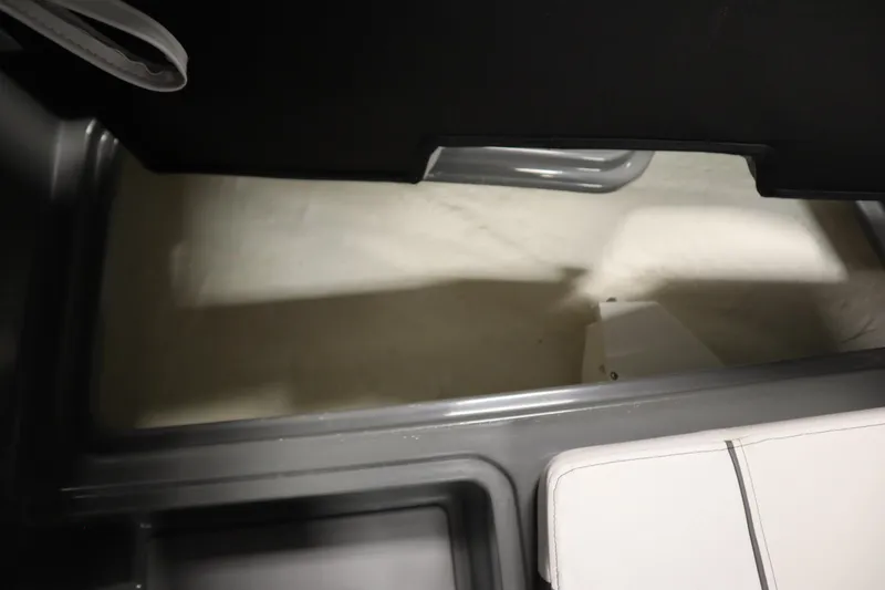 Slide: The Image of Interior view of 2022 Heyday H22 boat, featuring seating and storage area. - 16
