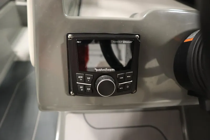 Slide: The Image of Rockford Fosgate audio system in 2022 Heyday H22 boat dashboard. - 23