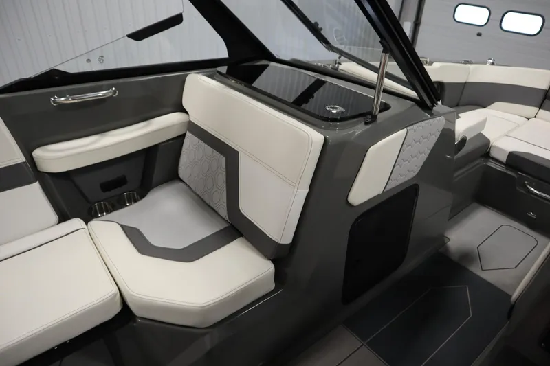 Slide: The Image of 2022 Heyday H22 boat interior with modern seating and sleek design. - 28