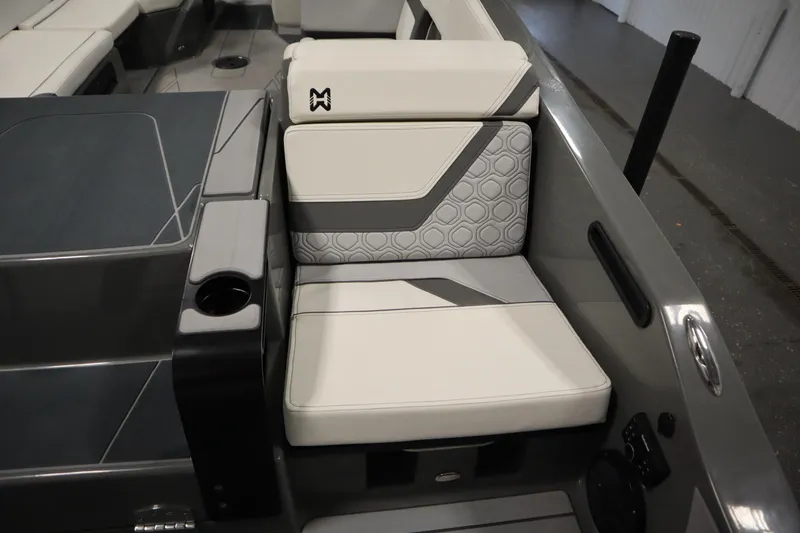 Slide: The Image of 2022 Heyday H22 boat interior with stylish seating and cup holder. - 48