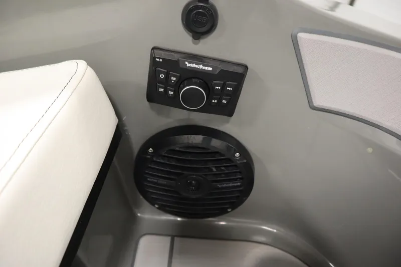 Slide: The Image of 2022 Heyday H22 boat interior with Rockford Fosgate audio controls and speaker. - 49