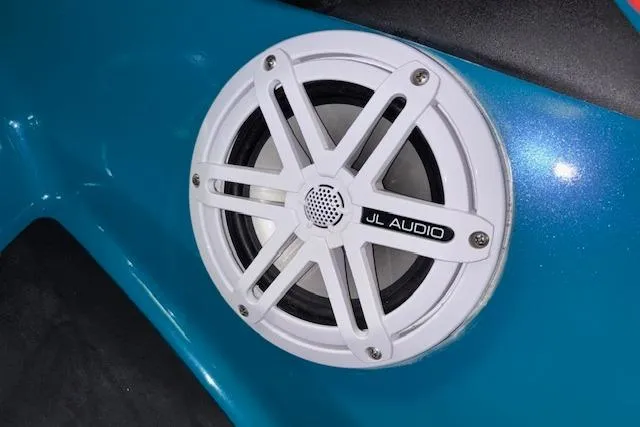 Slide: The Image of 2018 Sea-Doo Wake 155 with JL Audio speaker on blue body. - 12