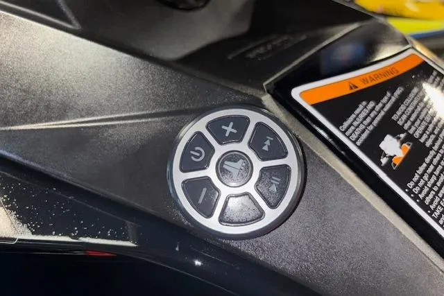 Slide: The Image of Control panel of a 2018 Sea-Doo Wake 155 jet ski with warning label. - 13