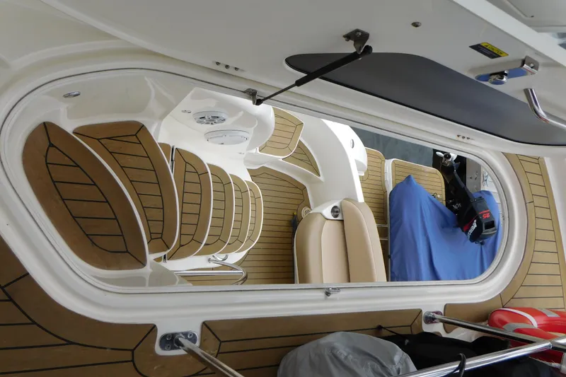 Slide: The Image of Interior view of 2009 Meridian 391 Sedan yacht with stylish seating and wood flooring. - 22