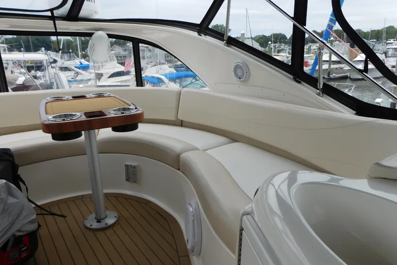 Slide: The Image of Luxurious interior of 2009 Meridian 391 Sedan yacht with elegant seating and table. - 23