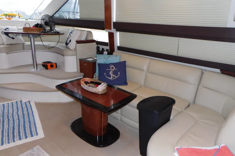 Slide: The Image of Luxurious interior of 2009 Meridian 391 Sedan yacht with elegant seating and nautical decor. - 27