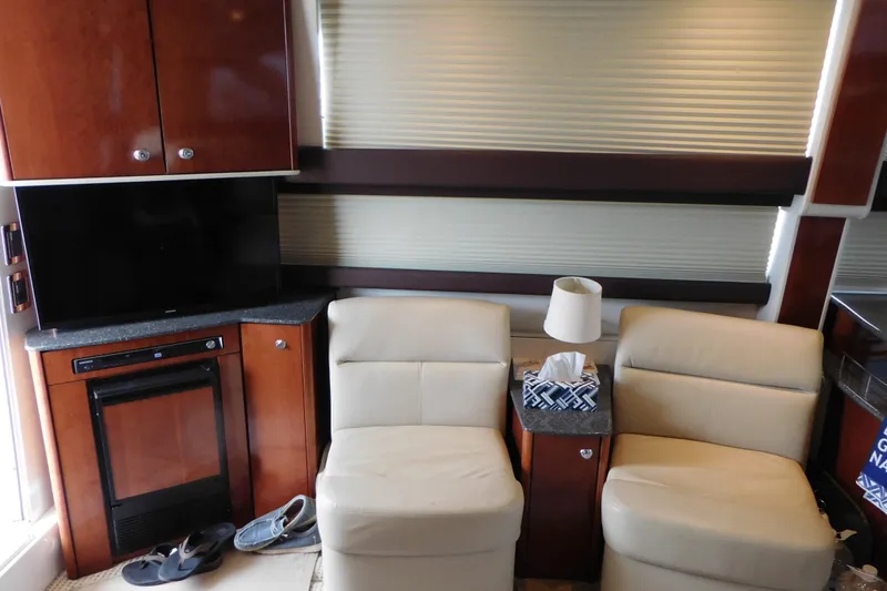 Slide: The Image of Interior of 2009 Meridian 391 Sedan with beige seating and wooden cabinetry. - 28