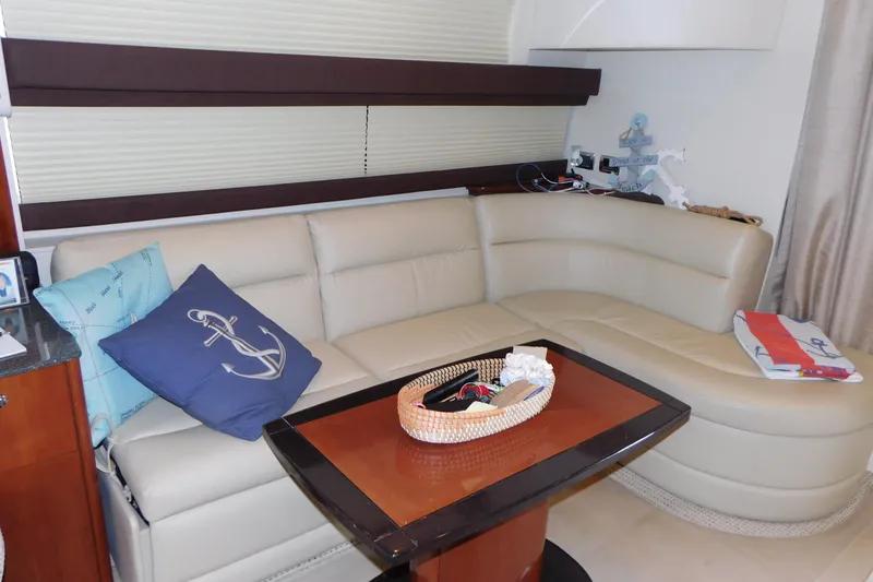 Slide: The Image of Luxurious interior of 2009 Meridian 391 Sedan with cream leather seating and nautical decor. - 29
