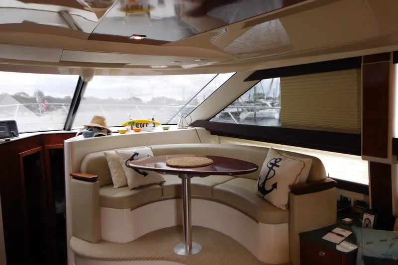 Slide: The Image of Luxurious interior of 2009 Meridian 391 Sedan yacht with cozy seating and nautical decor. - 30