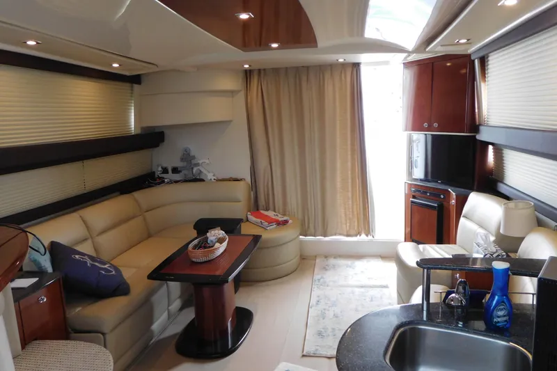 Slide: The Image of Luxurious interior of a 2009 Meridian 391 Sedan yacht with elegant seating and modern amenities. - 32