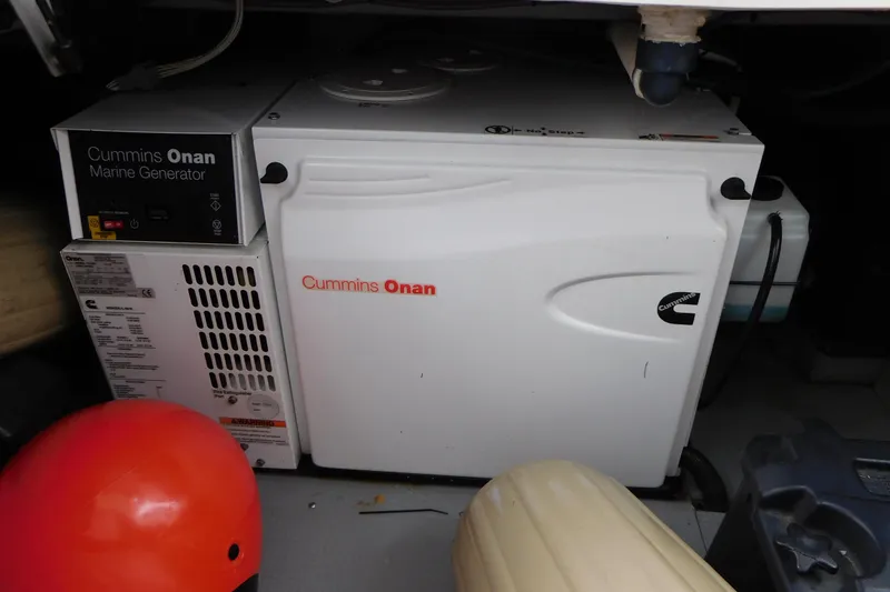 Slide: The Image of Cummins Onan marine generator in 2009 Meridian 391 Sedan boat engine room. - 40