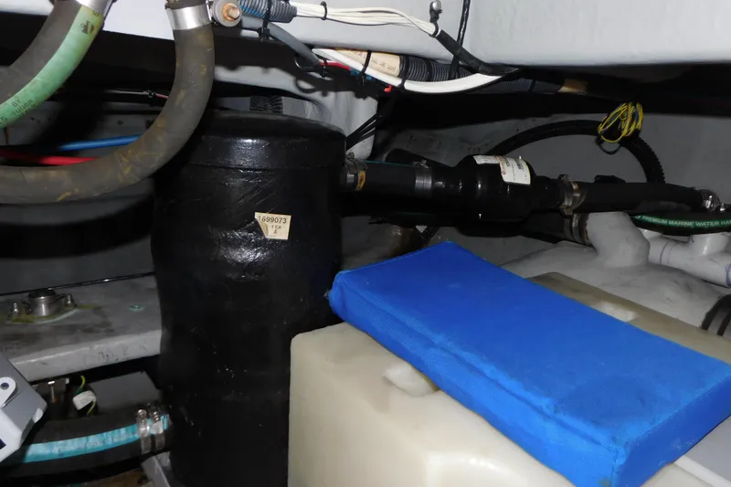 Slide: The Image of Engine compartment of a 2009 Meridian 391 Sedan with hoses and components. - 41