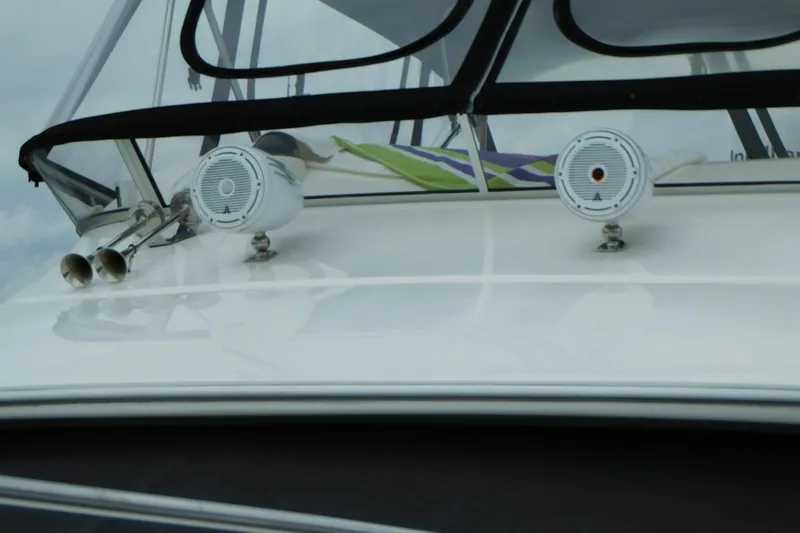 Slide: The Image of 2009 Meridian 391 Sedan yacht with speakers and horn on deck. - 43