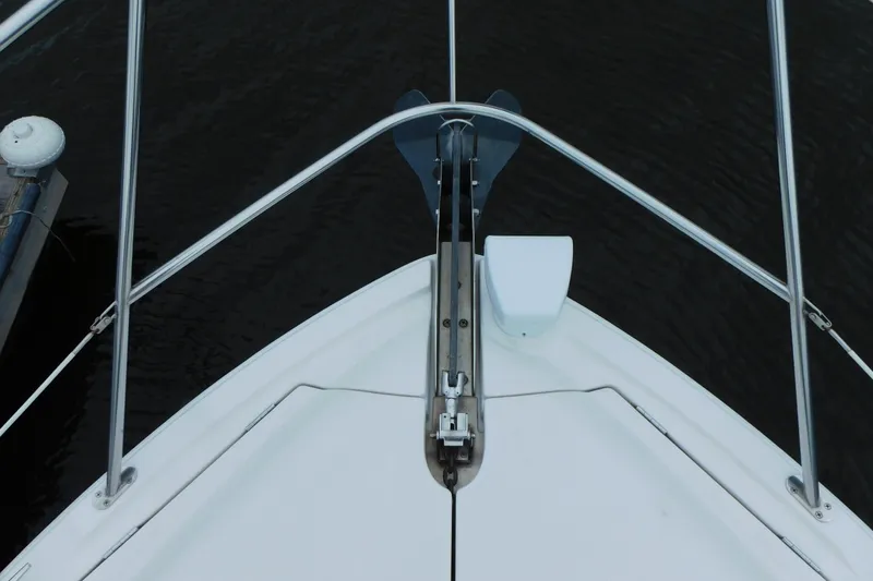 Slide: The Image of Bow view of 2009 Meridian 391 Sedan yacht with anchor and railing. - 9