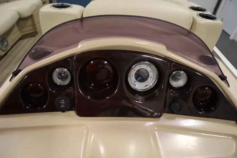 Slide: The Image of Dashboard of 2018 Sylvan 820 Mirage boat with gauges and USB input. - 20