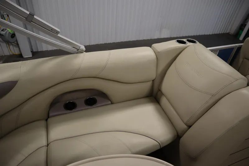 Slide: The Image of Luxurious beige seating on 2018 Sylvan 820 Mirage boat with cup holders. - 28