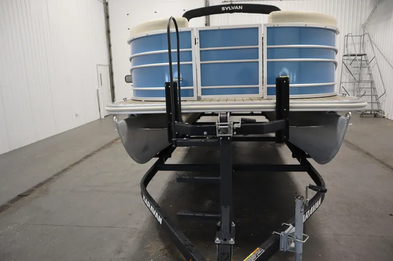 Slide: The Image of 2018 Sylvan 820 Mirage pontoon boat on trailer in indoor storage. - 38