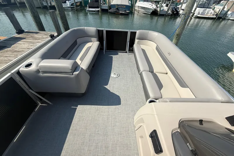 Slide: The Image of 2022 Princecraft Vectra 23 RL pontoon boat interior with spacious seating and modern design. - 8