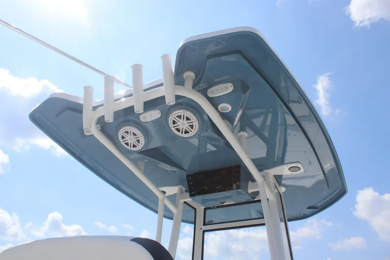 Slide: The Image of Tidewater 2210 Carolina Bay 2026 boat top view with speakers and rod holders. - 15