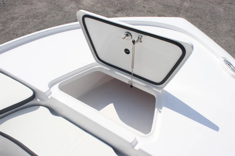 Slide: The Image of Open storage compartment on 2026 Tidewater 2210 Carolina Bay boat. - 22