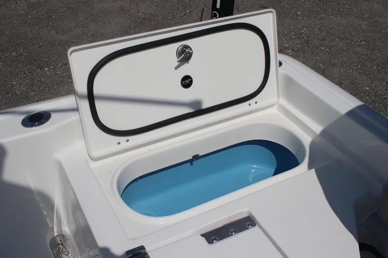 Slide: The Image of Open storage compartment on 2026 Tidewater 2210 Carolina Bay boat. - 6