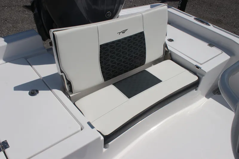 Slide: The Image of 2026 Tidewater 2210 Carolina Bay boat seat with stylish black and white upholstery. - 8
