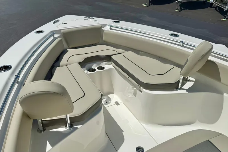 Slide: The Image of 2026 Key West 239 FS boat interior with seating and table, showcasing modern design. - 16