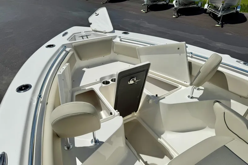 Slide: The Image of Storage compartment of 2026 Key West 239 FS boat, featuring a clean, white interior. - 19