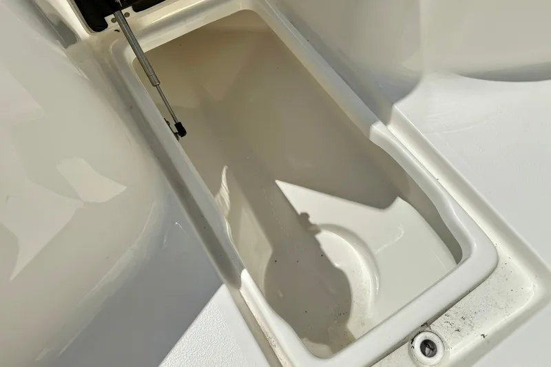 Slide: The Image of 2026 Key West 239 FS boat seat with quilted design and speaker detail. - 20