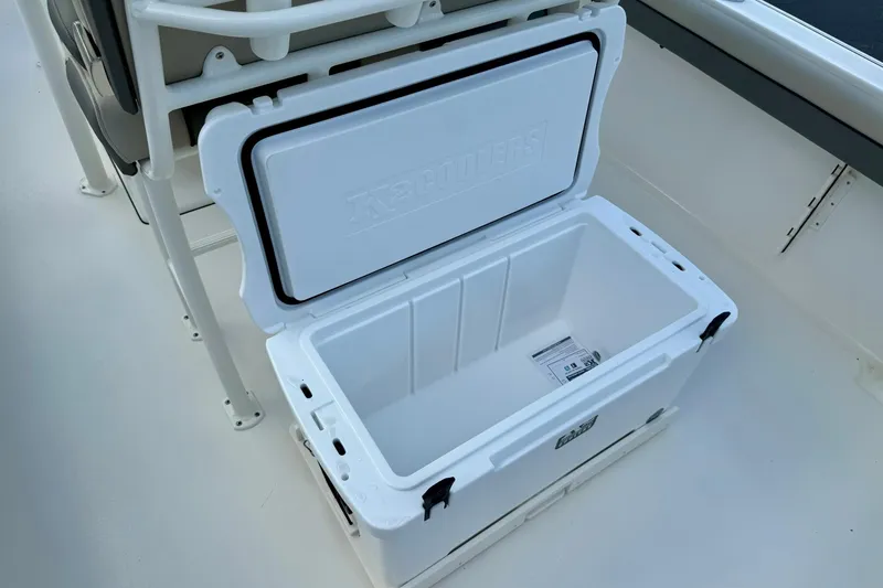Slide: The Image of Interior view of 2026 Key West 239 FS boat, showcasing sleek white design and storage features. - 33