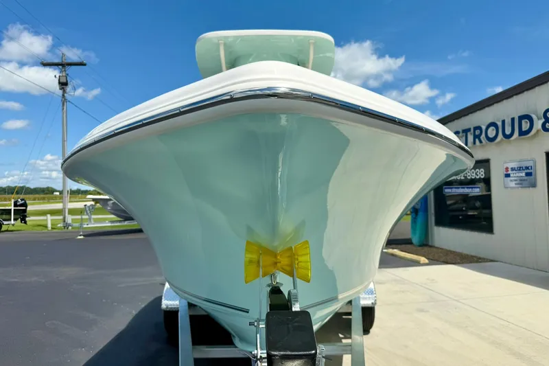 Slide: The Image of 2026 Key West 239 FS boat hull close-up, displayed outdoors on a trailer. - 7