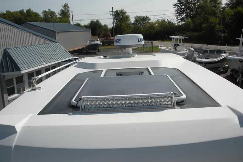 Slide: The Image of 2019 Beneteau Barracuda 9 boat roof with radar and light bar. - 10
