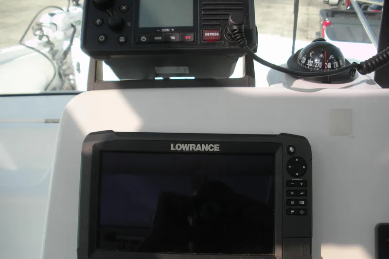 Slide: The Image of Control panel of a 2019 Beneteau Barracuda 9 with Lowrance navigation system. - 14