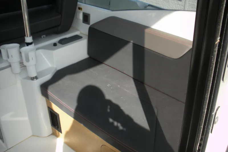 Slide: The Image of Interior seating of 2019 Beneteau Barracuda 9 boat with rod holders. - 18