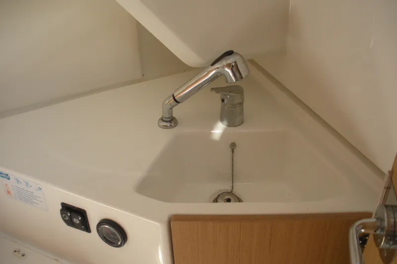 Slide: The Image of 2019 Beneteau Barracuda 9 boat interior sink with modern faucet design. - 8