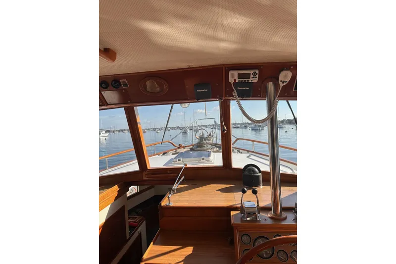 Slide: The Image of Interior view of 1984 Grand Banks 42 Classic yacht, showcasing helm and navigation equipment. - 9